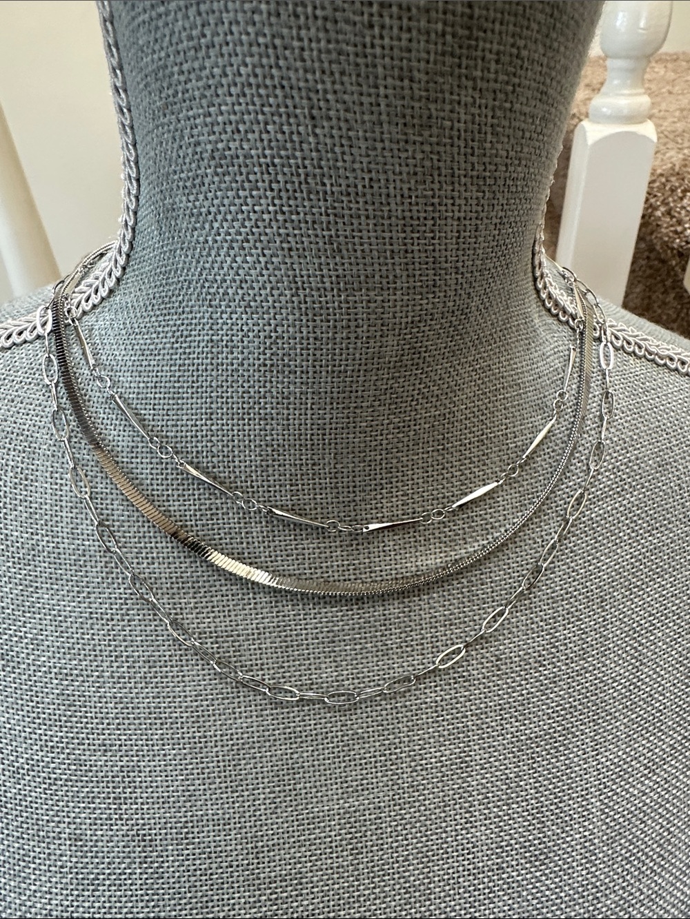 Nwt. 3 tiered silver necklace   Adjustable in back. Not real silver!
